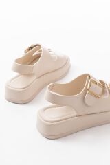 1187 Bej Dolgu Topuk Lastik Baretli  Kadın Sandalet